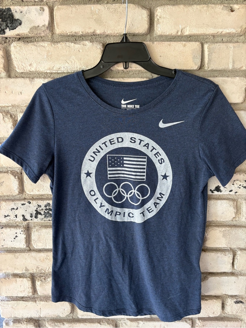 Nike Dri-fit Navy Tee shirt with Silver U.S. Olympic Emblem graphic